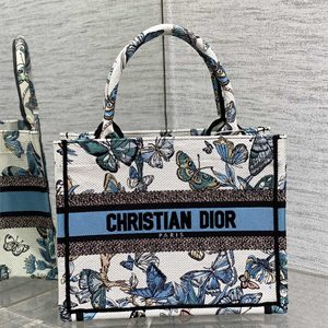 CD Small Book Tote Toile de Jouy Mexico Embroidery White and Pastel Midnight Blue