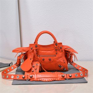 Women's NEO Cagole XS Handbag In Arena Lambskin Orange Color