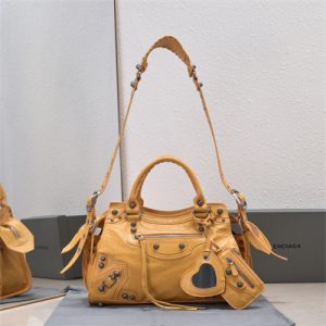 Women's NEO Cagole City Small Handbag In Arena Lambskin Yellow Color