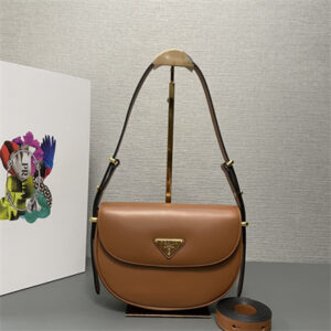 Prada Arqué leather shoulder bag with flap Cognac 1BD365