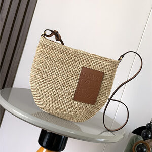 Loewe Slit pochette bag in raffia and calfskin Nature /Tan